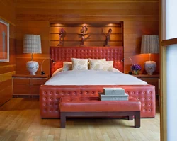 Red bed in the bedroom interior photo