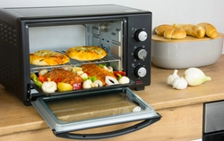 Mini oven in the kitchen photo