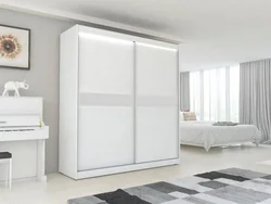 Glossy wardrobes in the bedroom photo