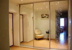 Built-in wardrobe in the hallway photo with mirrors