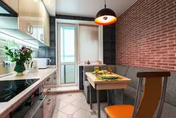 Design of a narrow and long kitchen with a balcony