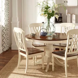 White kitchen interior with brown table