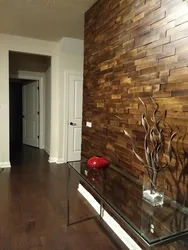 Hallway design in an apartment with laminate flooring on the wall