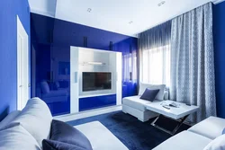 Living room with blue furniture photo