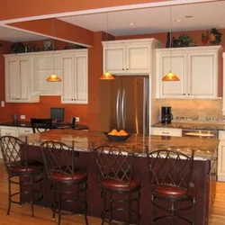 Terracotta color kitchen photo in the interior