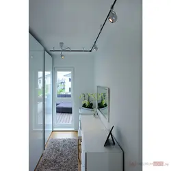 Track lighting system in the bedroom interior