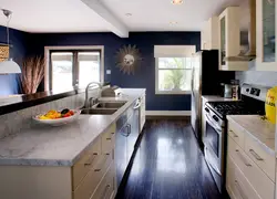 Blue color of the walls in the kitchen in the interior