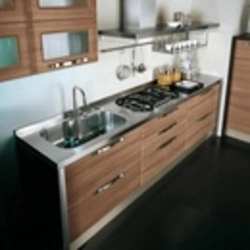 Раковина и плита рядом на кухне фото