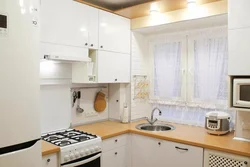Kitchen design 6m2 with photo refrigerator and gas stove