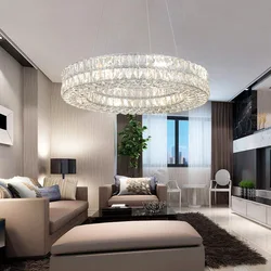 Low chandelier in the living room interior