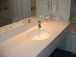 Countertop Made Of Artificial Stone In The Bathroom Design