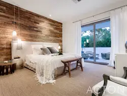 Bedroom interior with laminate on one wall