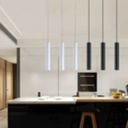 Светильники над барной стойкой на кухне подвесные в интерьере