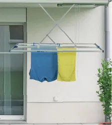 Drying clothes in bathroom photo