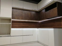 Corner Kitchen With Mezzanine Ceiling Photo