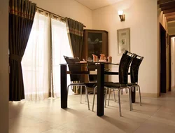 Brown curtains in the kitchen interior