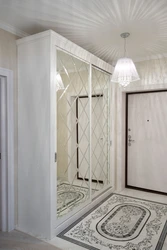 White wardrobe in the hallway in the interior