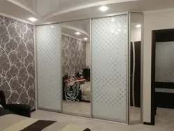 Sloping wardrobe in the hallway photo in modern