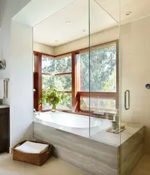Bath by the window in a country house photo