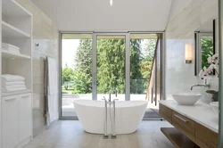 Bath by the window in a country house photo