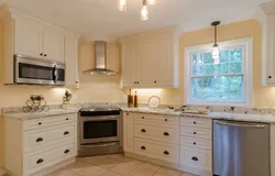 Corner kitchen with stove in the corner photo