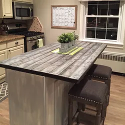 Do-it-yourself table from a countertop for the kitchen photo