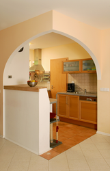 Kitchens with arches and bar counters photo