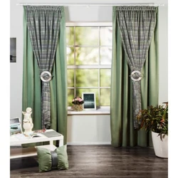 Gray-green curtains in the living room interior