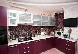 Wallpaper in the interior of a burgundy kitchen