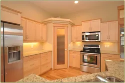 Kitchens with a large corner cabinet photo