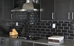 Black tiles in the kitchen interior