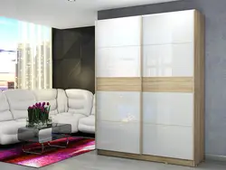 Facades of sliding wardrobes in the living room photo