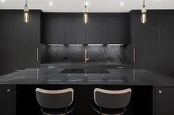Black countertop black kitchen photo