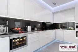 Kitchen with white countertop and apron in the interior