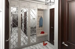 Hallway Closet With Mirror And Hanger Photo
