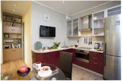 Kitchens in apartments on one wall photo