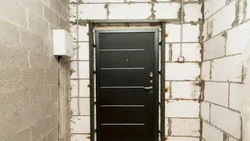 Installation Of Metal Entrance Doors In An Apartment Photo