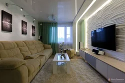 Интерьер гостиной с диваном и телевизором фото
