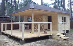 Summer kitchen with sauna and terrace under one roof photo