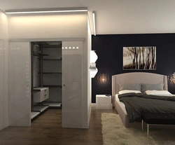 Dressing room in a rectangular bedroom photo