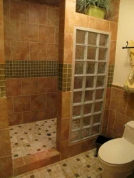 Bathtub with tile shower tray photo