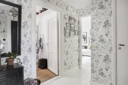 Kitchen and hallway with the same wallpaper photo