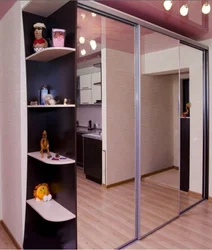 Built-In Wardrobe In The Hallway With One Mirror Photo