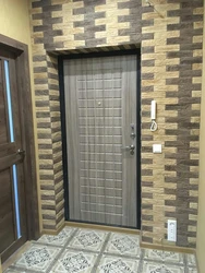 Finishing Doors With Decorative Stone In The Hallway Photo