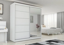 Photo of wardrobes with a mirror in the bedroom photo