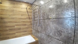 Decorative plaster for walls in the bathroom interior photo