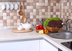 Lay out beautiful tiles in the kitchen photo