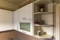 Kitchen interior with one wall cabinet