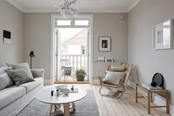 Gray beige wallpaper in the living room interior