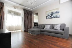 Living room interior with dark wallpaper and light furniture